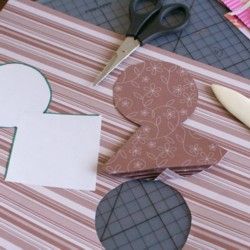 Cutting out the shape and beginning the accordion folds