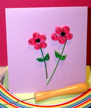 Two quilled flowers