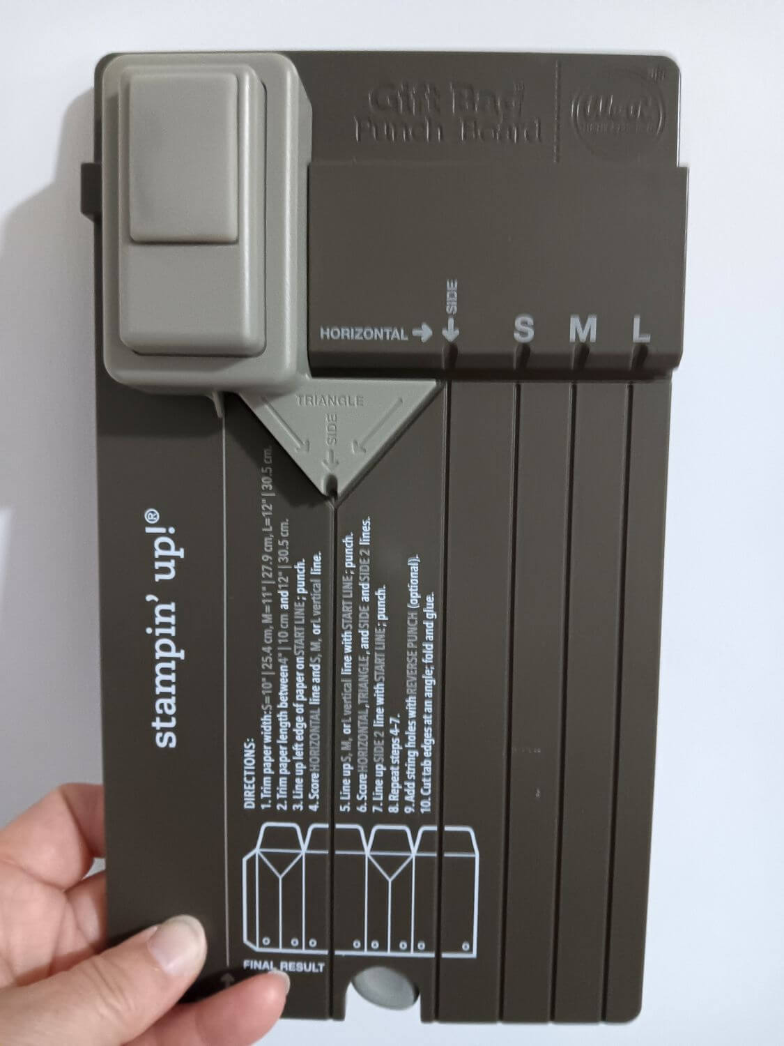 This is a picture of the kind of tool you can use to make all sorts of gift bags. Gift Bag Punch Board Tool