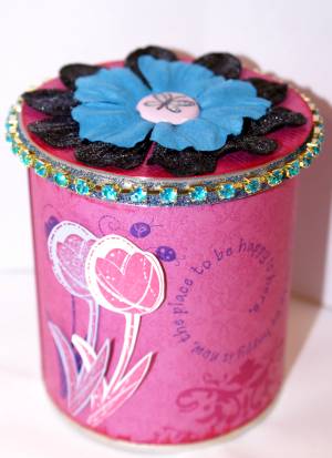 Here's a repurposed Pringles can I decorated with scrapbook supplies challenge yourself