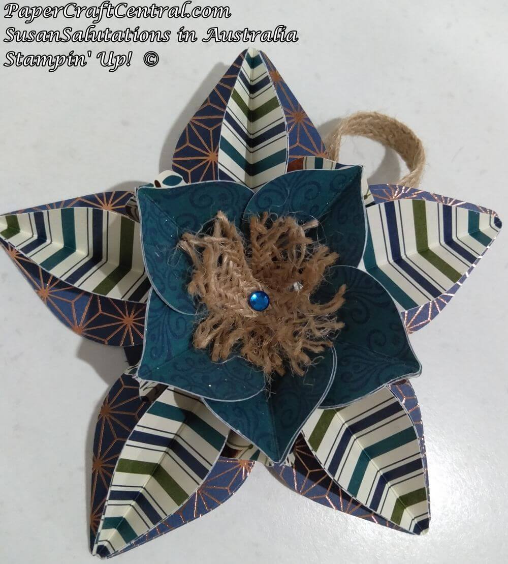 I made this decorative star from gold embossed designer series papers. It added a lot of glimmer to the finished star. Christmas Star