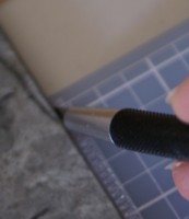 Here I am cutting one side of the protective cover page open with a craft knife. scrapbook page protectors