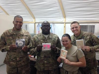 Military Personelle receiving some cards