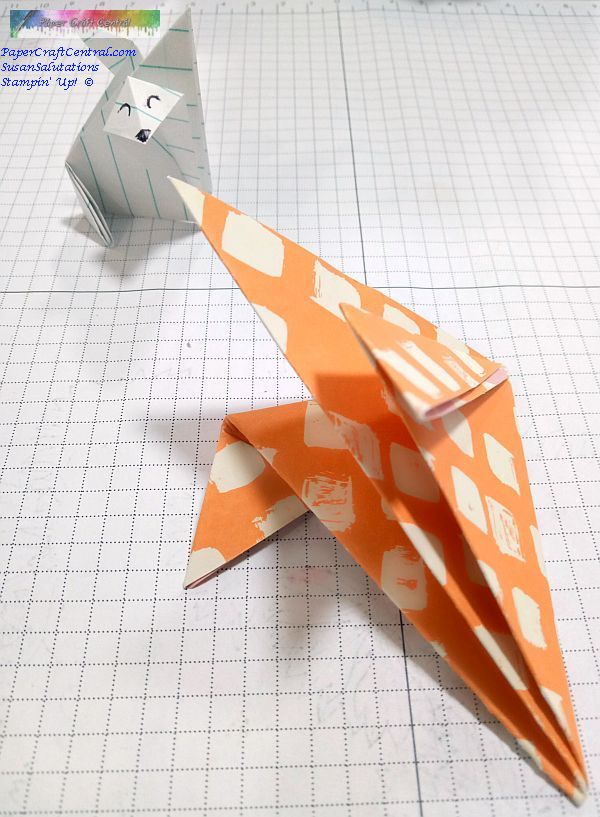 Origami fox face and ears.