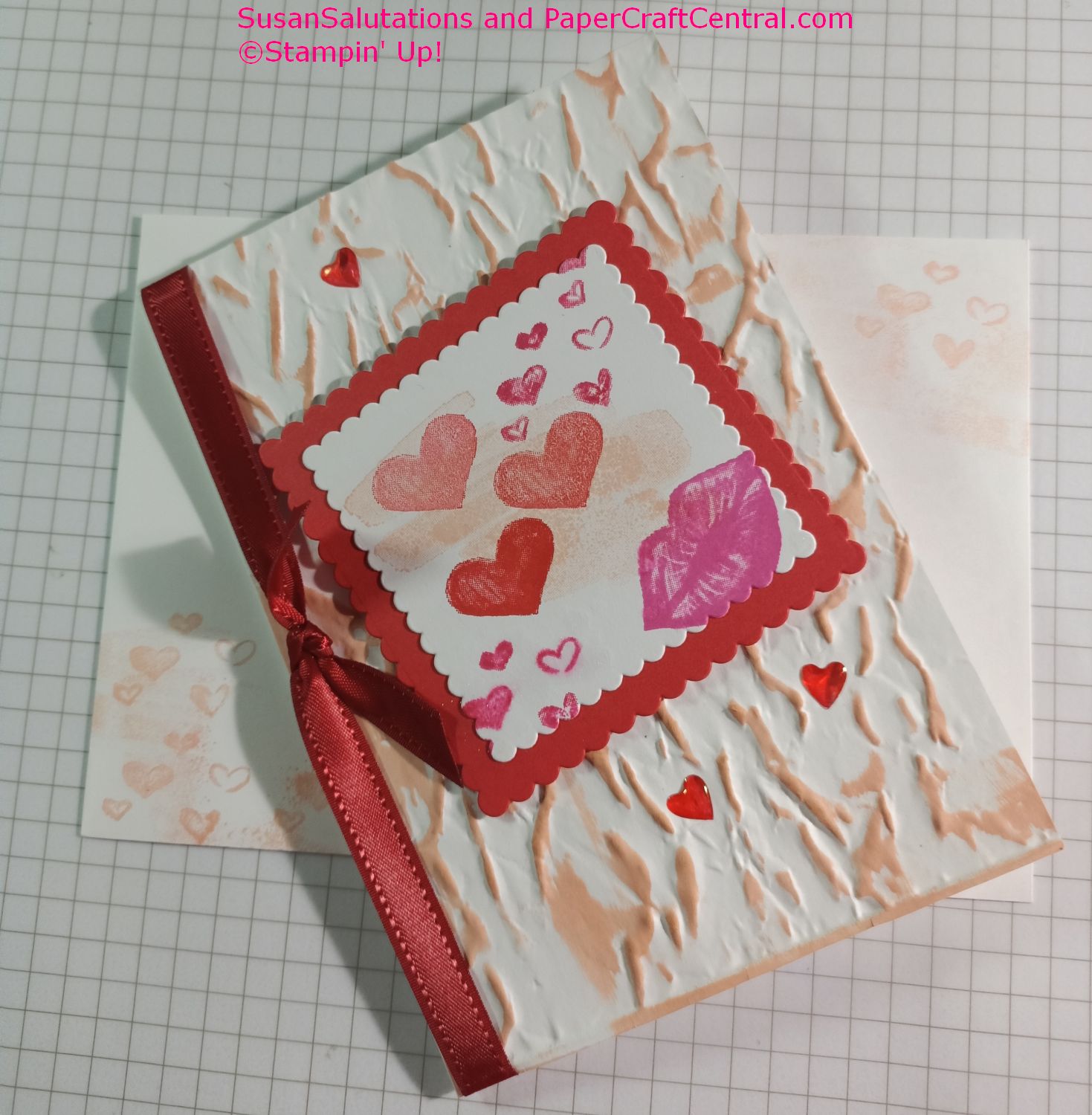It was fun to create a Valentine for my love with this stamp set. The only cutting was the mats on the front.I coloured the acrylic hearts with a Stampin' Blend. Hearts and Kisses stamp set
