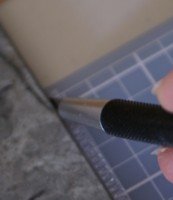 Here I am cutting one side of the protective cover page open with a craft knife. scrapbook page protectors